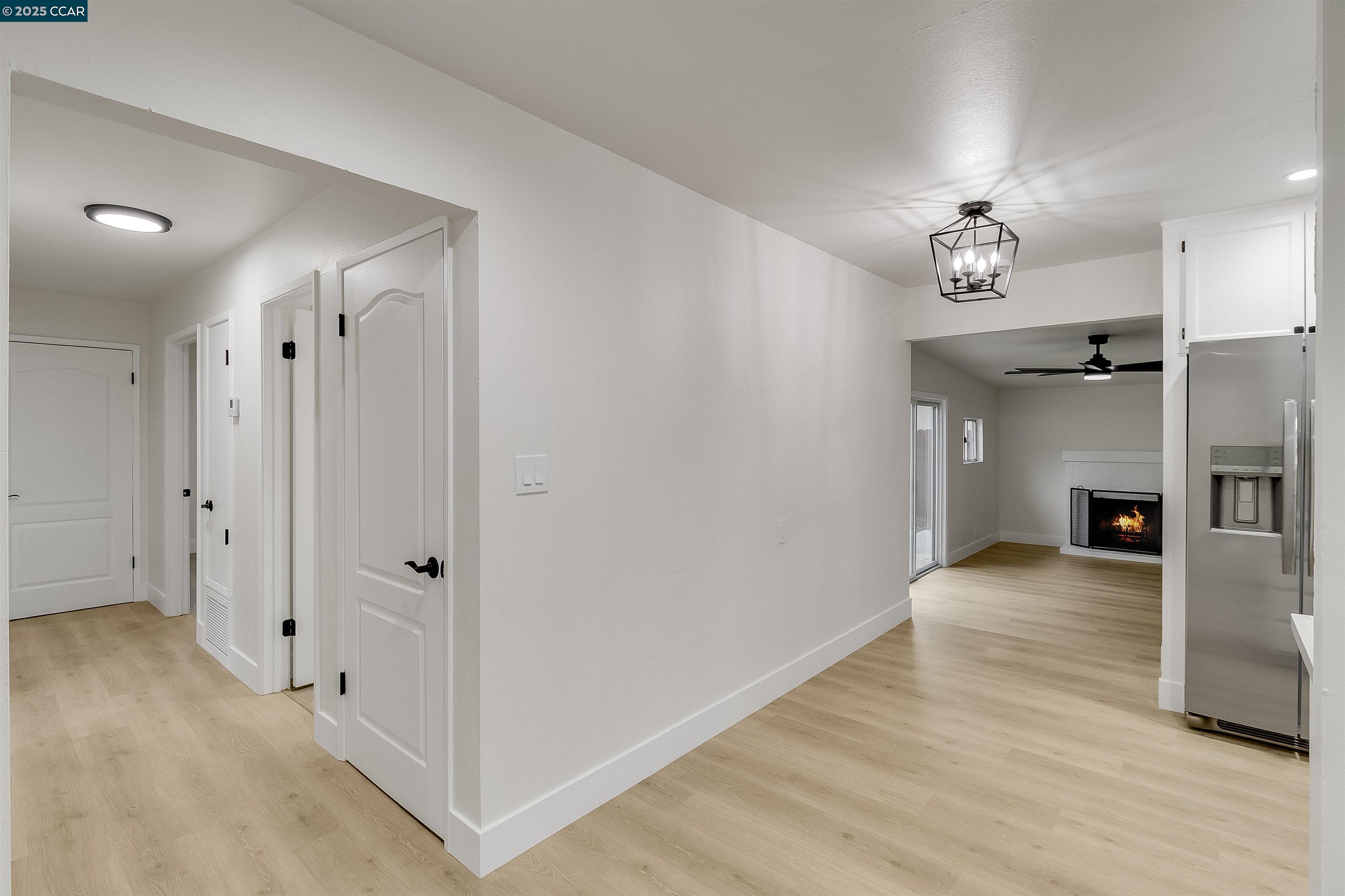 1863 San Clemente Street Fairfield, CA 94533 - Photo 11 of 29 a view of a hallway with a kitchen