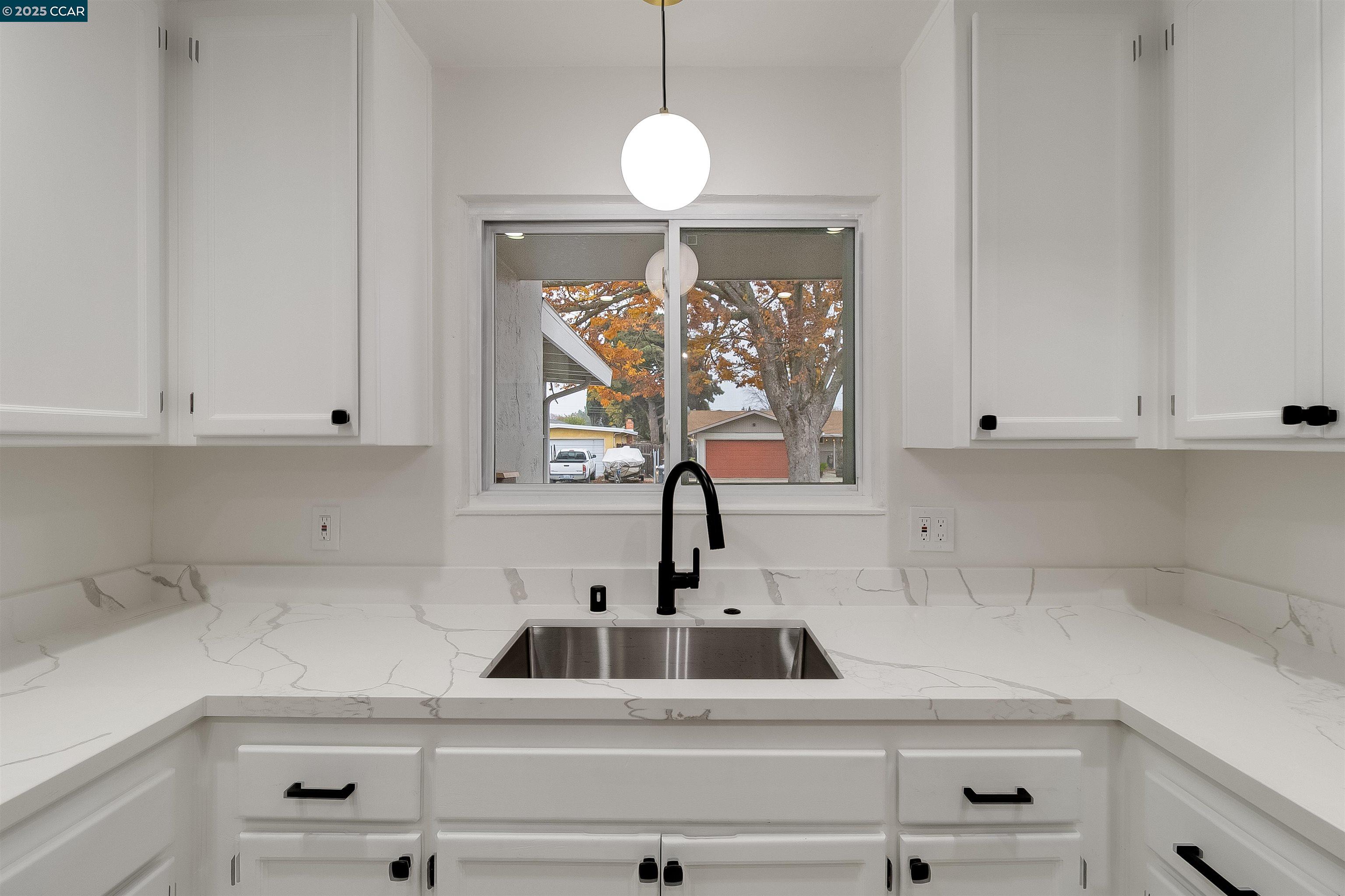 1863 San Clemente Street Fairfield, CA 94533 - Photo 14 of 29 a kitchen with a sink cabinets and window