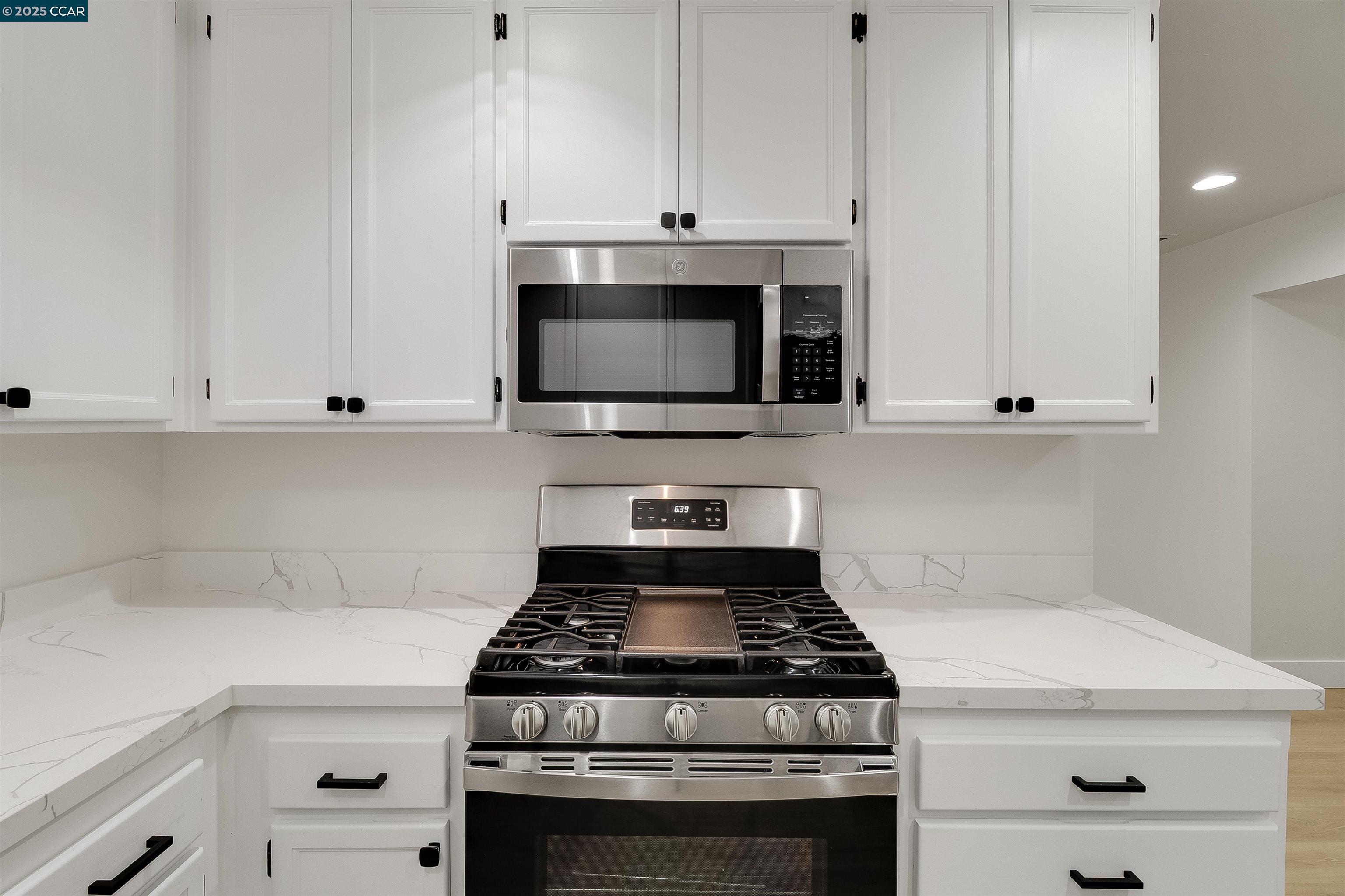 1863 San Clemente Street Fairfield, CA 94533 - Photo 15 of 29 a stove top oven sitting inside of a kitchen