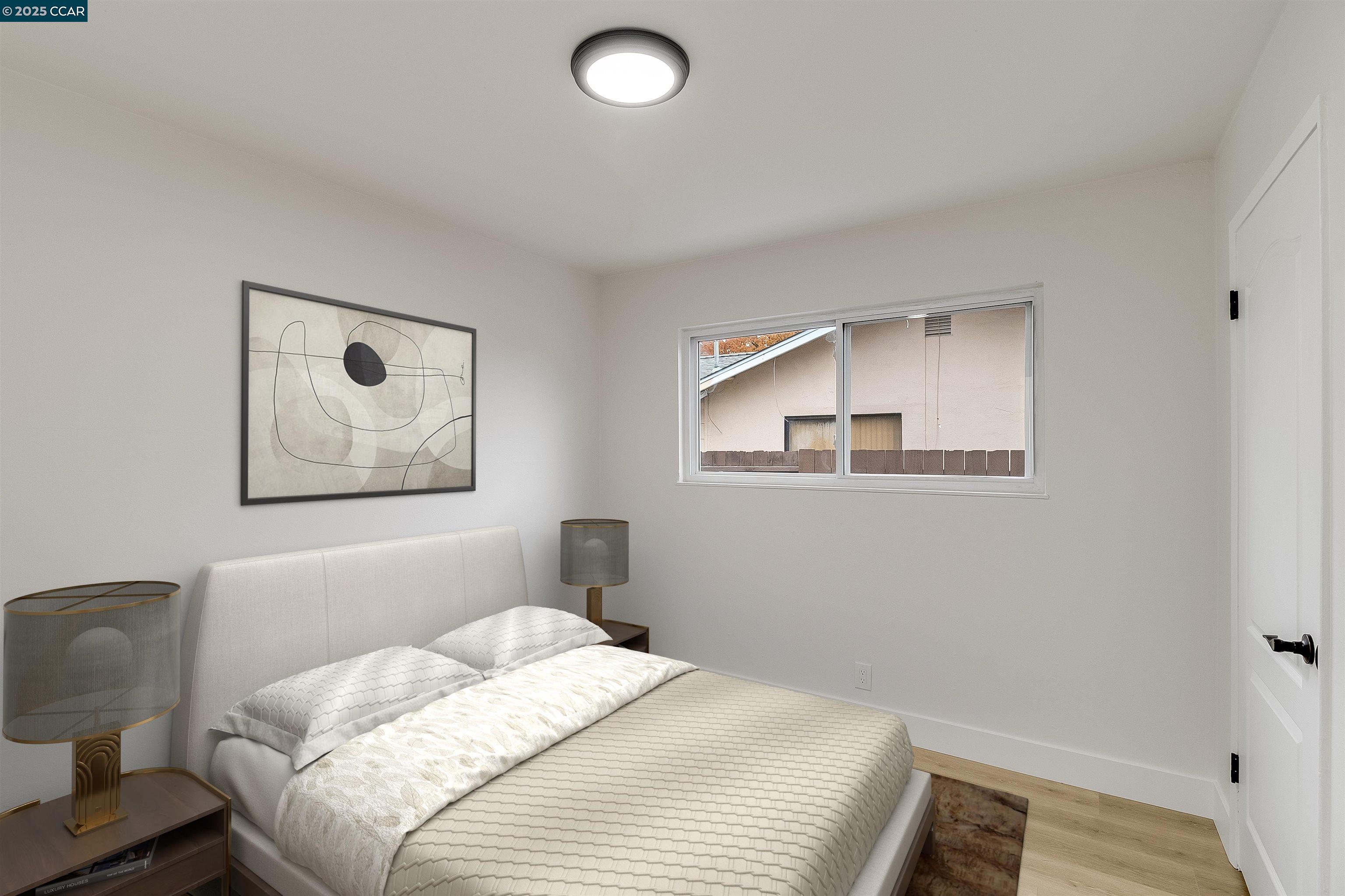 1863 San Clemente Street Fairfield, CA 94533 - Photo 22 of 29 a bedroom with a bed and a painting on the wall