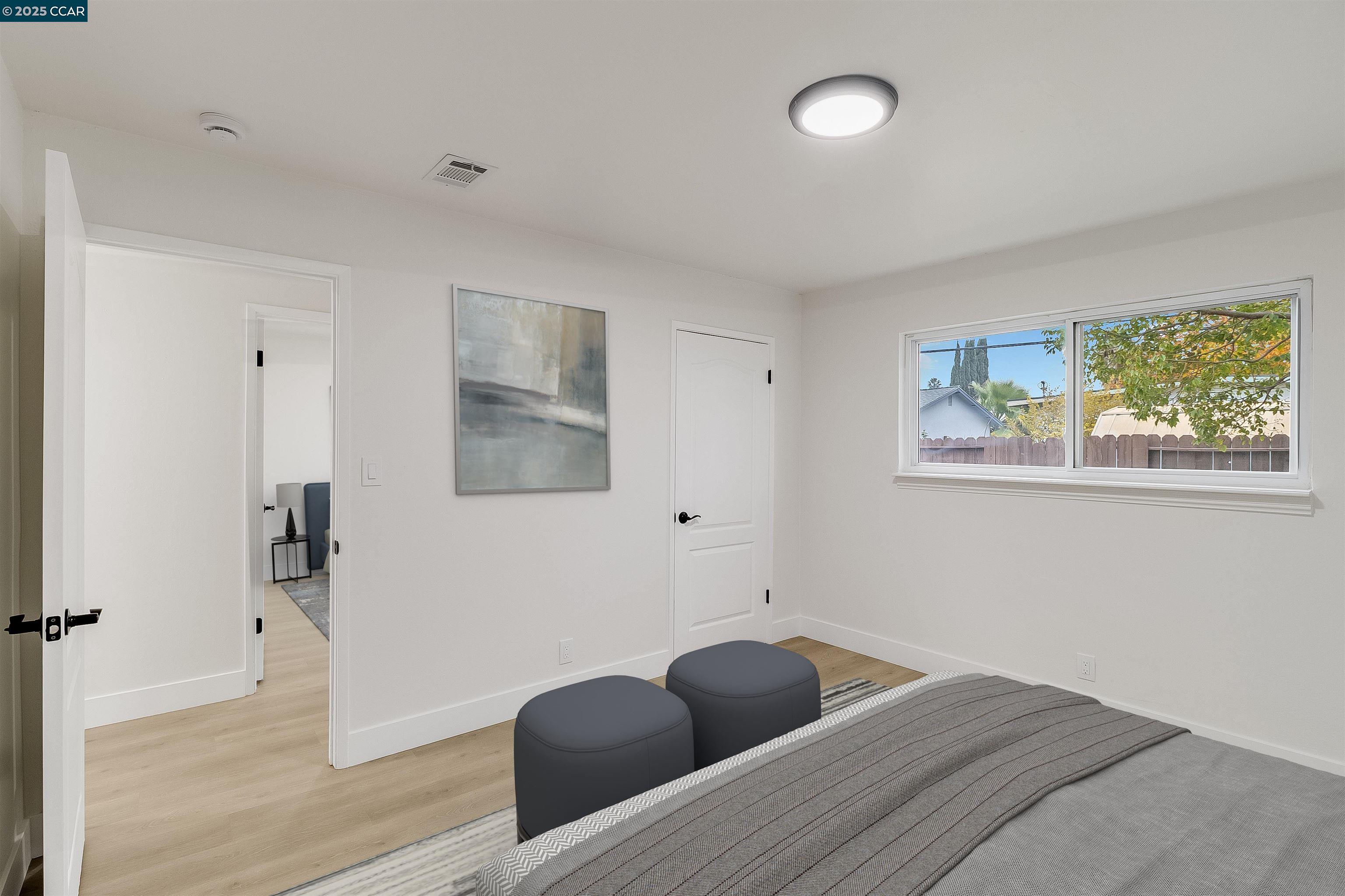 1863 San Clemente Street Fairfield, CA 94533 - Photo 25 of 29 a bedroom with furniture and wooden floor