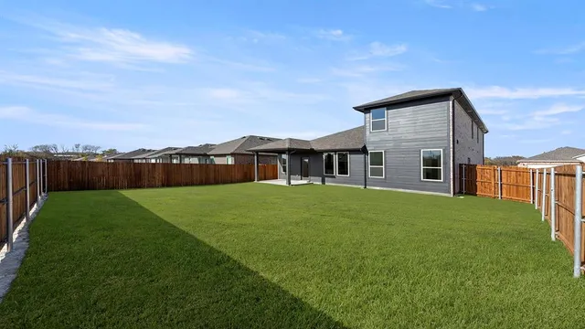 a house view with a garden space