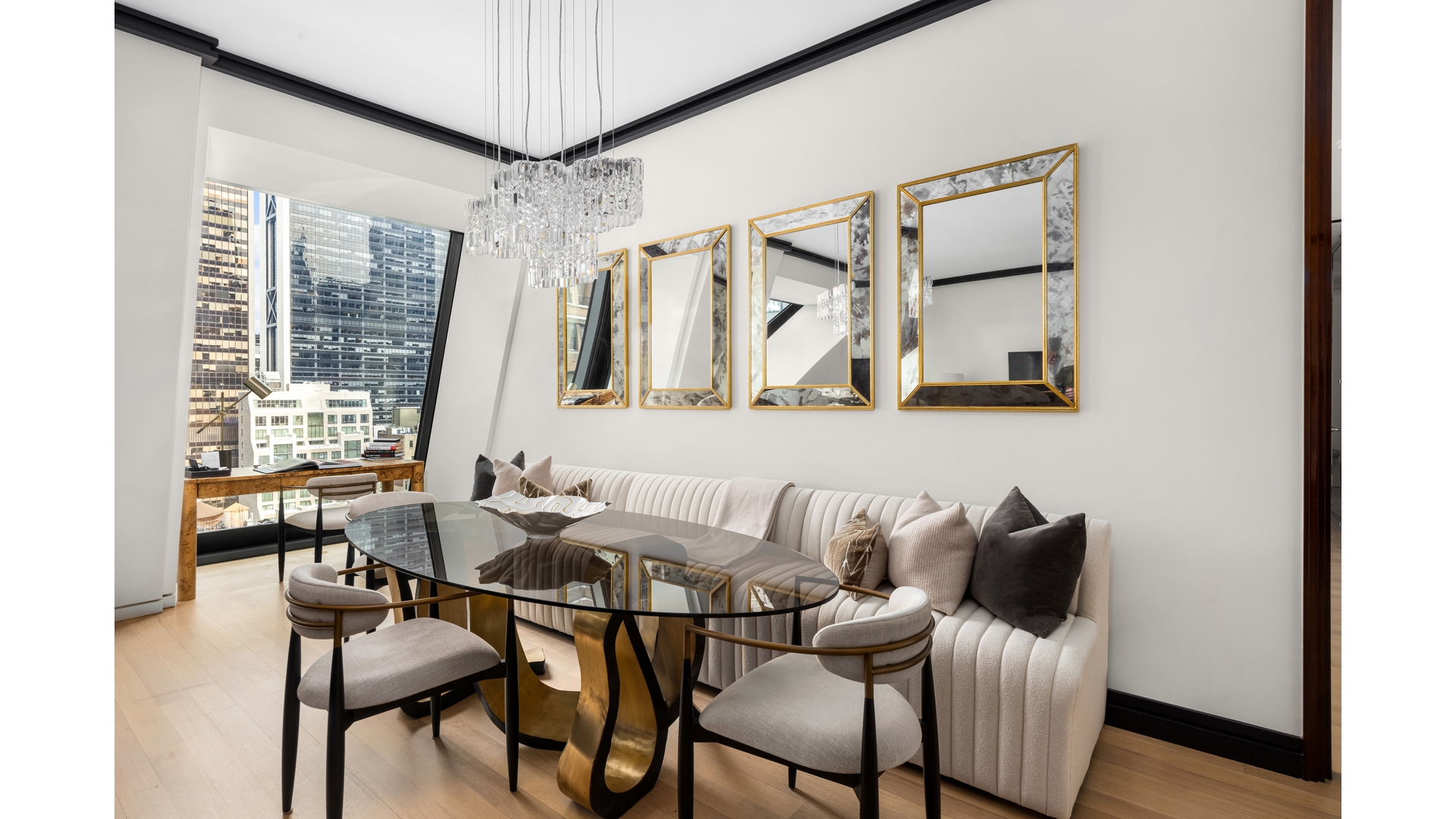 53 West 53rd Street, Unit 18B Manhattan, NY 10019 - Photo 4 of 17 a dining room with furniture and window