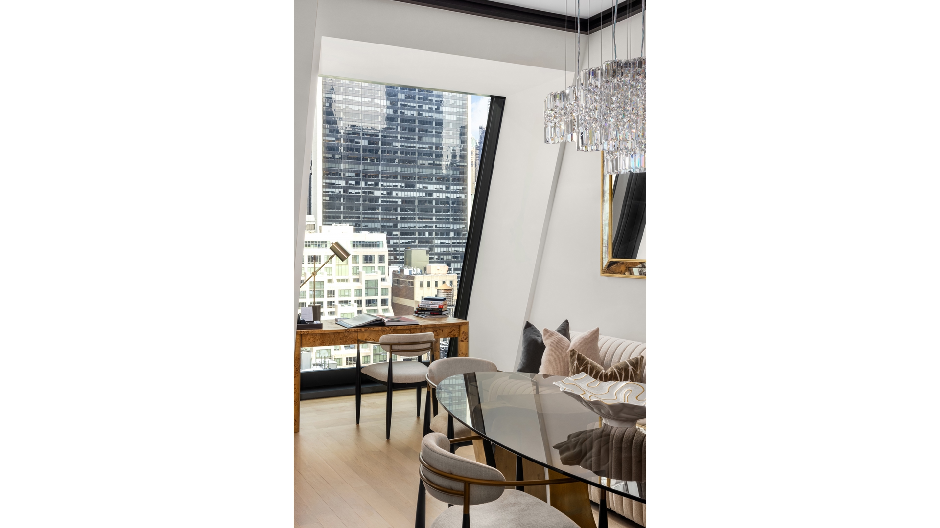 53 West 53rd Street, Unit 18B Manhattan, NY 10019 - Photo 6 of 17 a workspace room with furniture and a window
