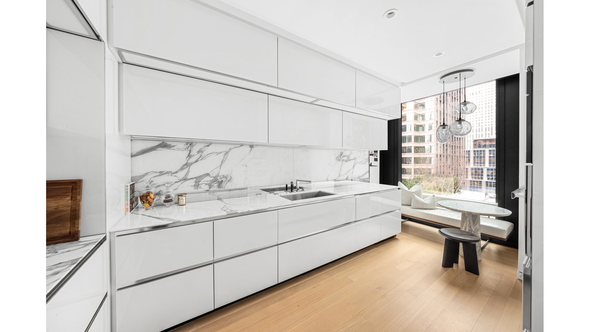53 West 53rd Street, Unit 18B Manhattan, NY 10019 - Photo 7 of 17 a room with a bed and a window