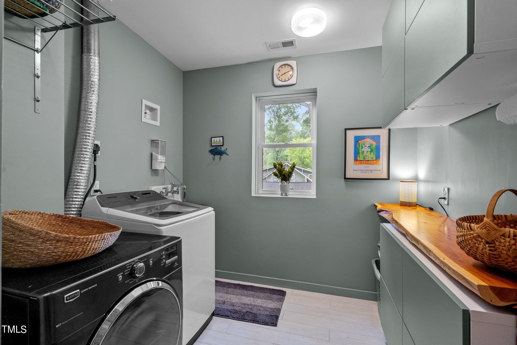 1330 Mordecai Drive Raleigh, NC 27604 - Photo 21 of 56 a utility room with dryer and washer