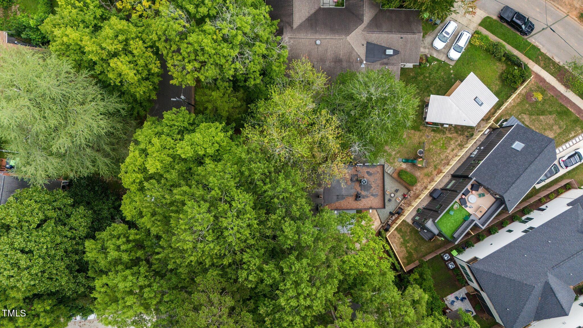 1330 Mordecai Drive Raleigh, NC 27604 - Photo 51 of 56 an aerial view of a house with a yard and garden