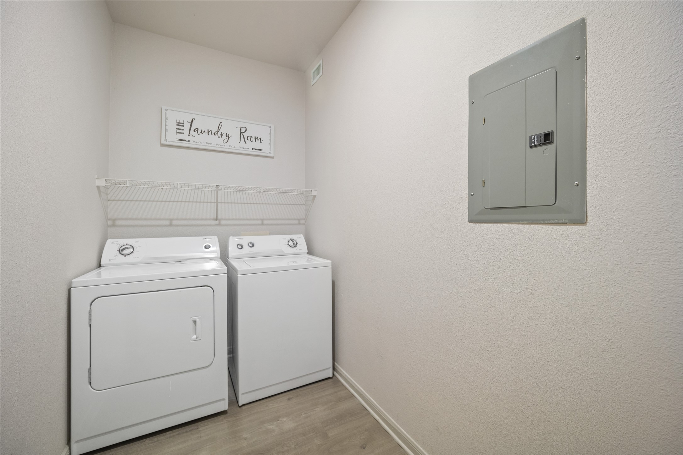 9494 Humble Westfield Road, Unit 3022 Humble, TX 77338 - Photo 12 of 22 a utility room with dryer and washer