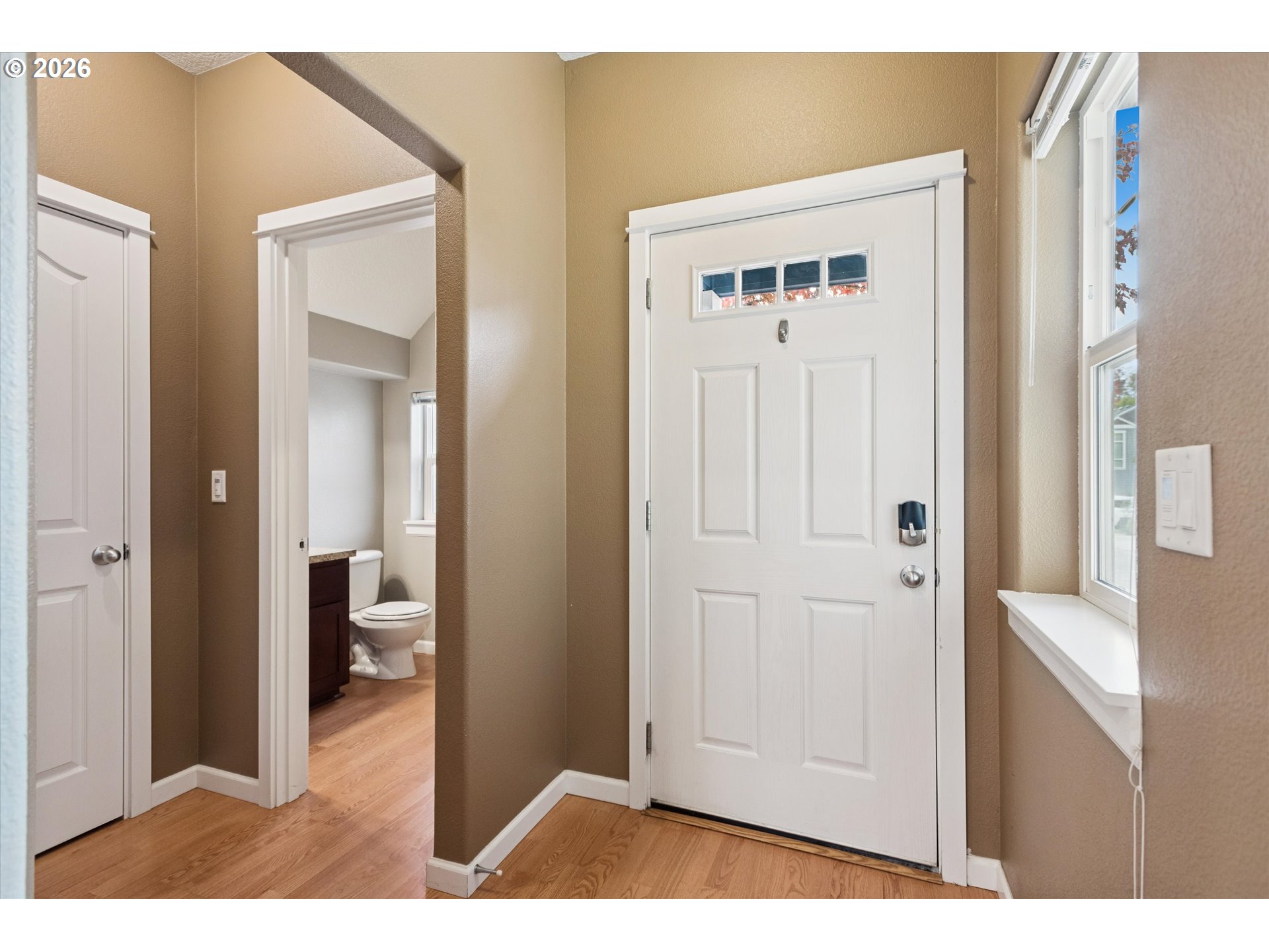 18232 Southwest Orlov Court Beaverton, OR 97078 - Photo 2 of 17 a view of a bathroom from a hallway