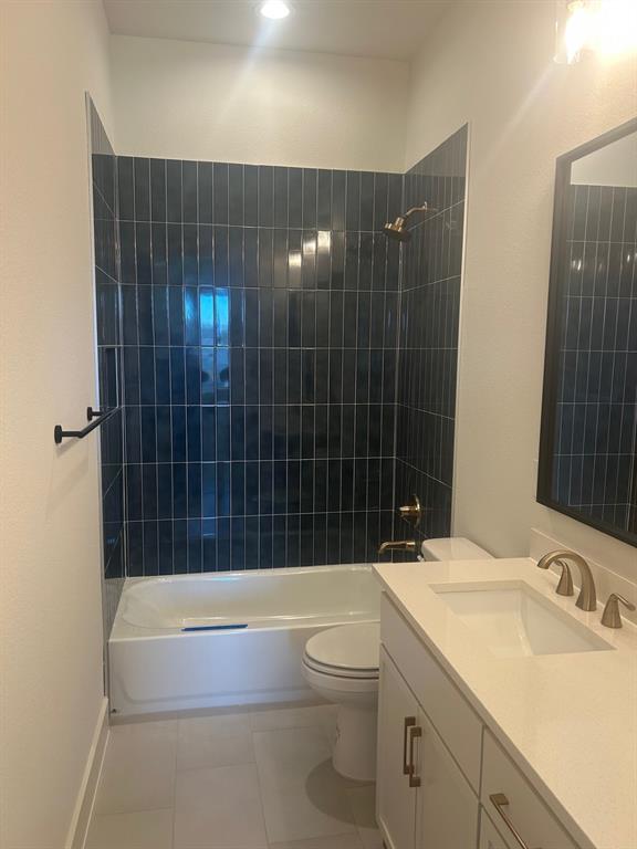 415 East Burks Street Pilot Point, TX 76258 - Photo 11 of 13 a bathroom with a sink a toilet and shower