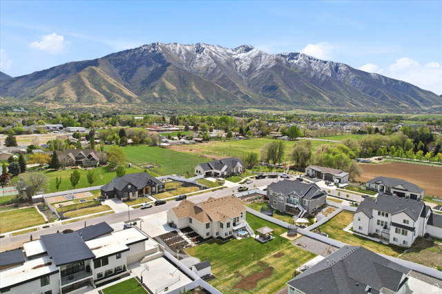 283 North 500 West Mapleton, UT 84664 - Photo 97 of 102 Aerial view of residential area featuring mountains.