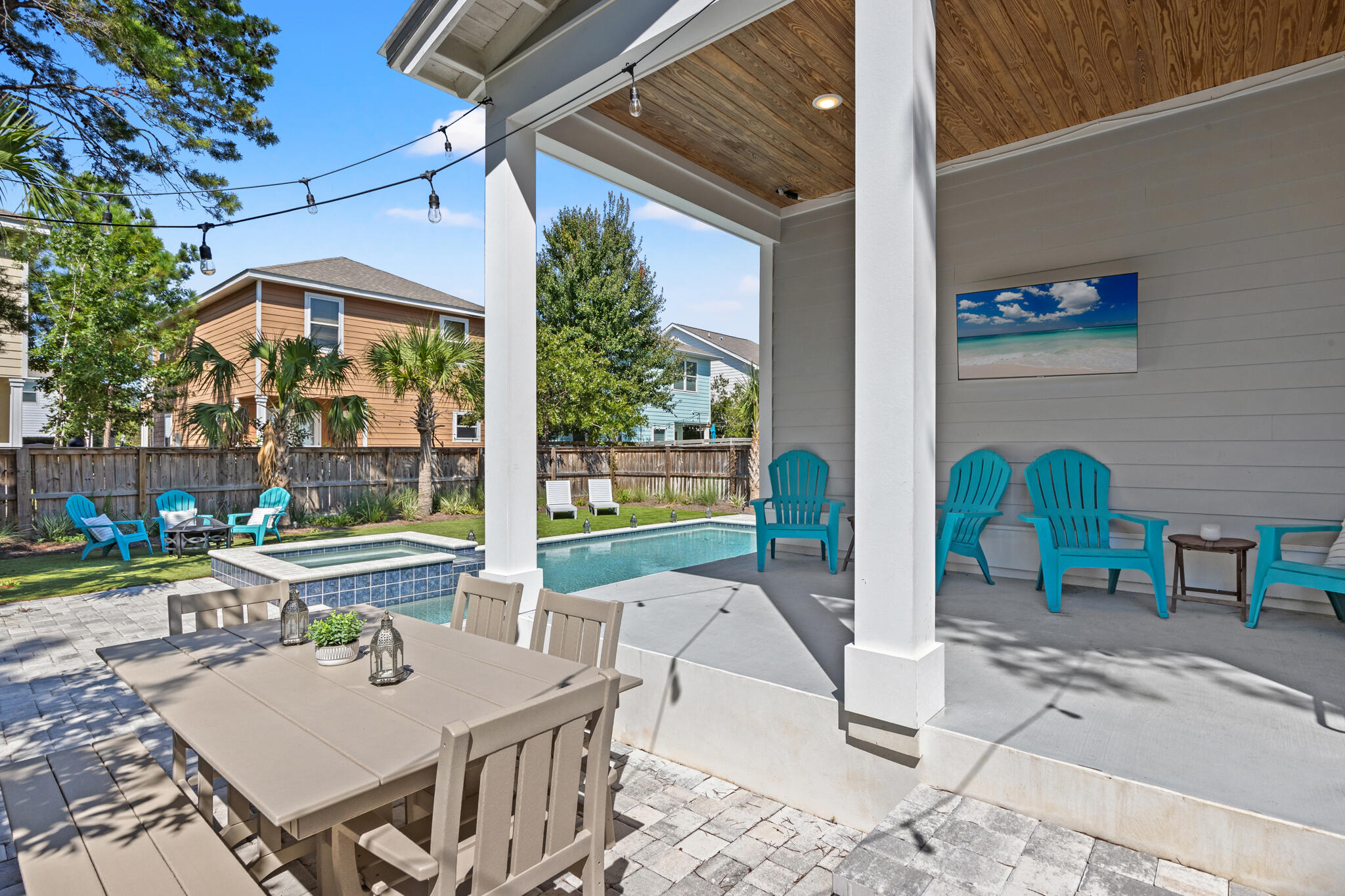 151 West Willow Mist Road Inlet Beach, FL 32461 - Photo 14 of 70 a patio with table and chairs and potted plants