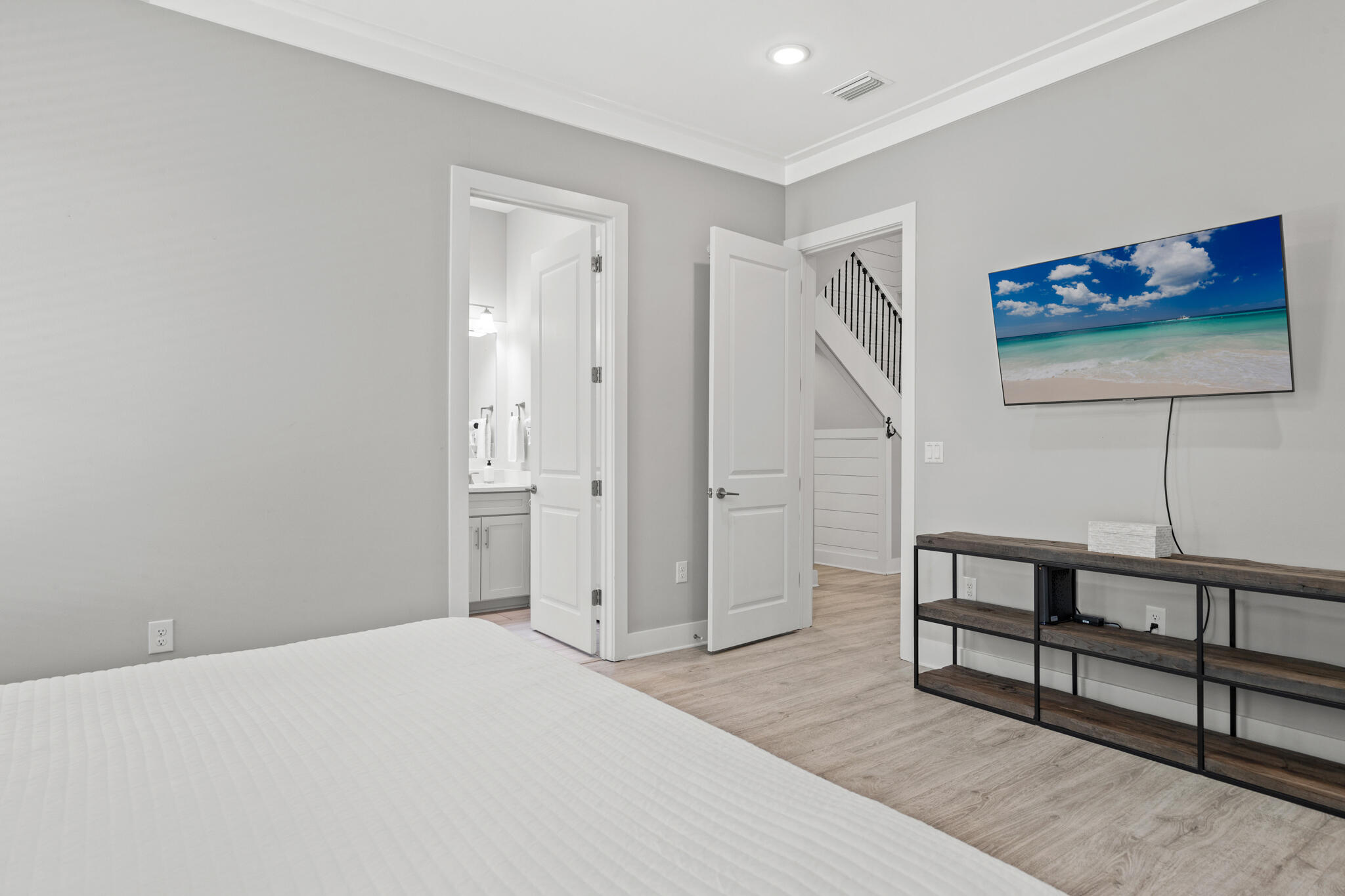 151 West Willow Mist Road Inlet Beach, FL 32461 - Photo 24 of 70 a bedroom with a bed and cabinets