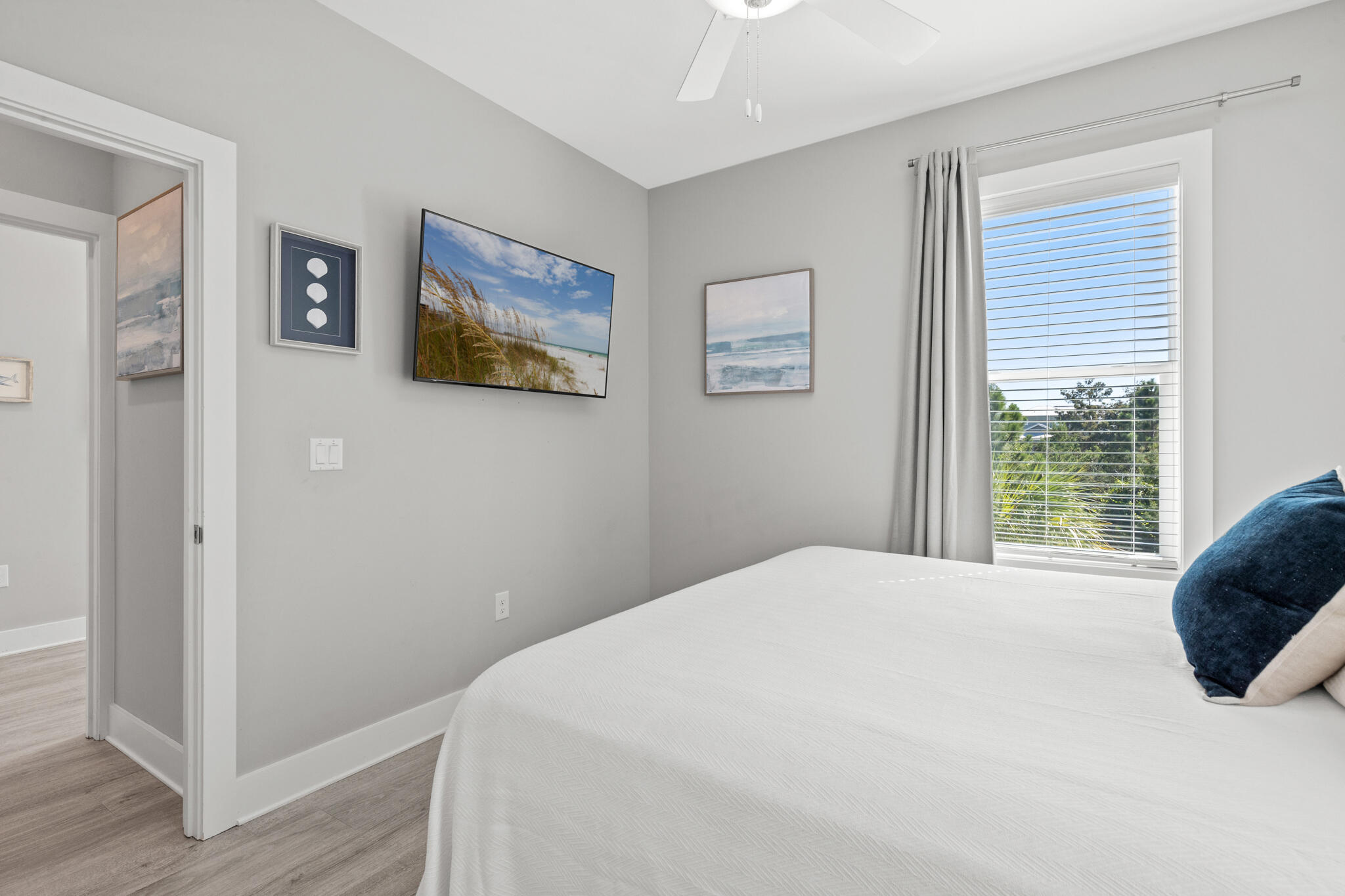 151 West Willow Mist Road Inlet Beach, FL 32461 - Photo 30 of 70 a bedroom with a large bed and a window
