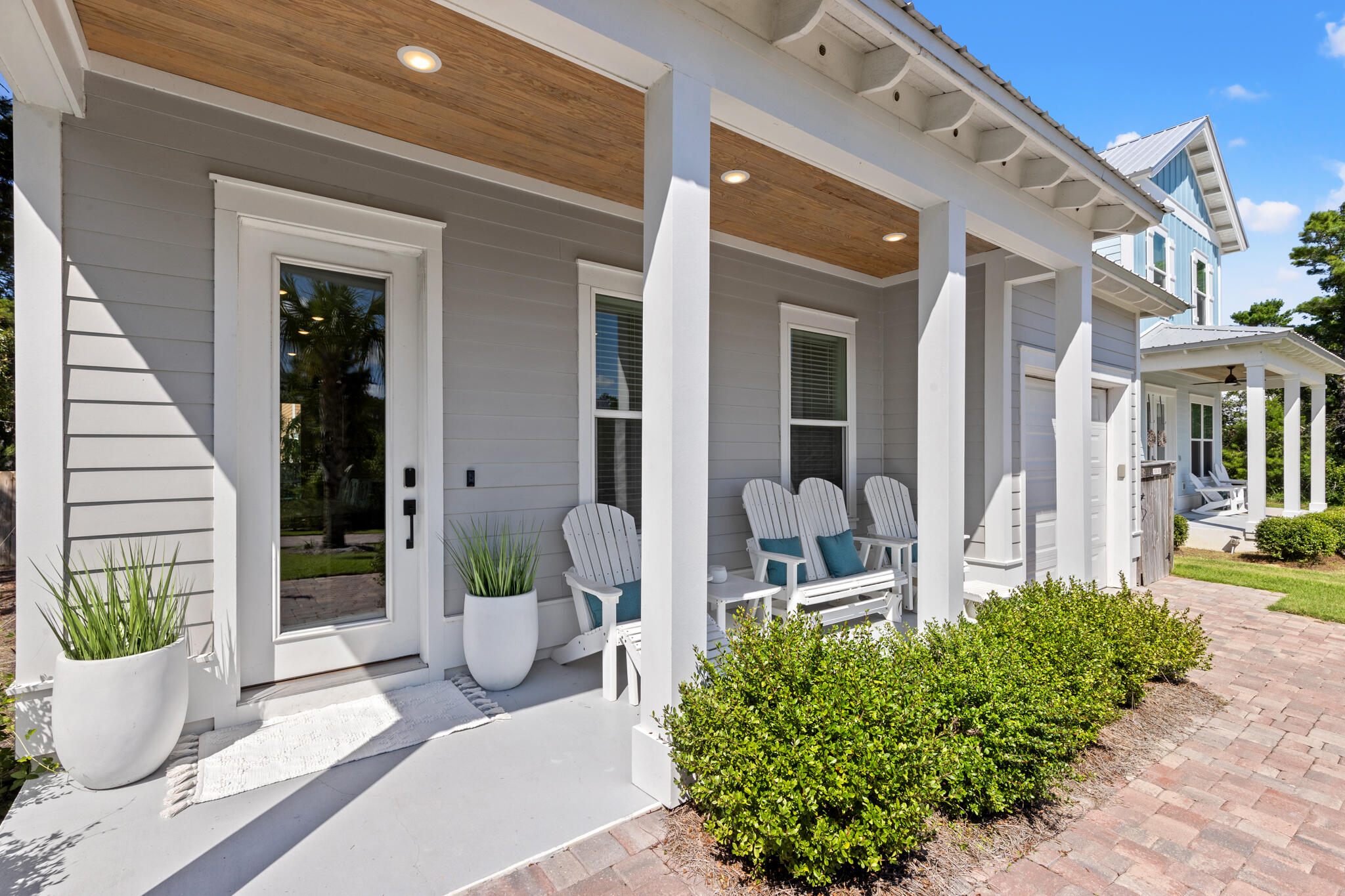 151 West Willow Mist Road Inlet Beach, FL 32461 - Photo 4 of 70 a front view of a house with outdoor seating and plants