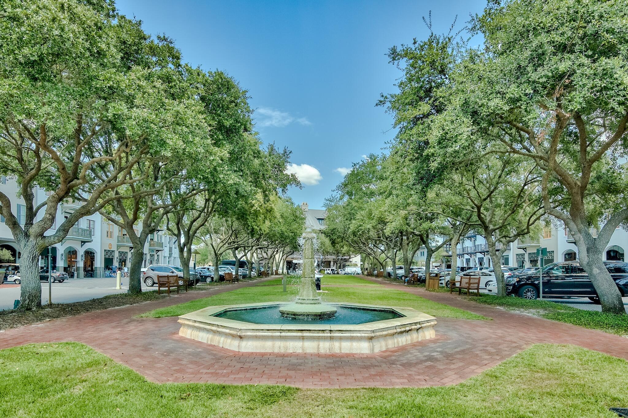 151 West Willow Mist Road Inlet Beach, FL 32461 - Photo 65 of 70 a view of a fountain in front of a house with large trees