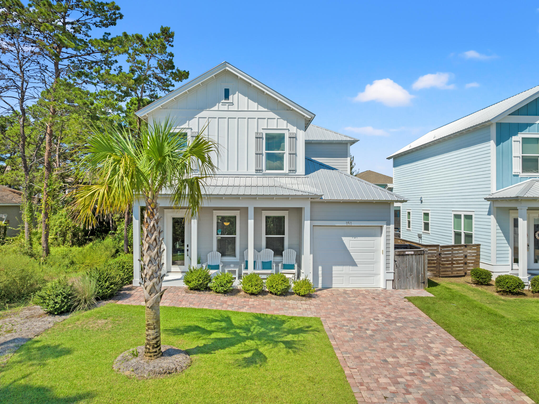 151 West Willow Mist Road Inlet Beach, FL 32461 - Photo 69 of 70 a front view of a house with a yard and porch