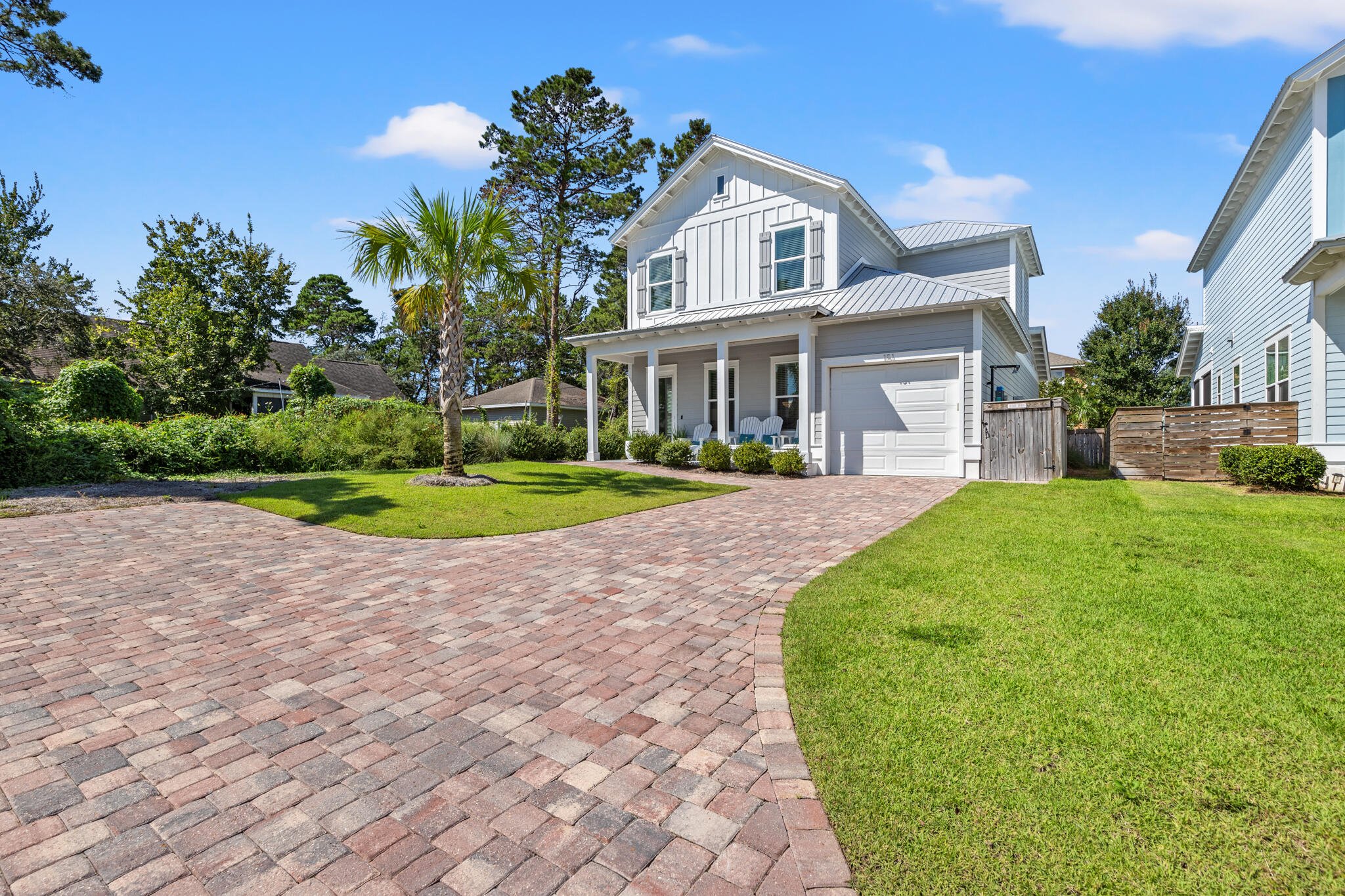 151 West Willow Mist Road Inlet Beach, FL 32461 - Photo 8 of 70 a front view of a house with a yard and trees