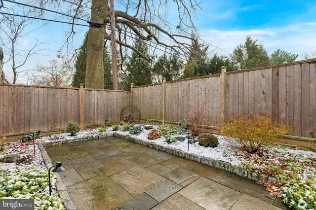 a view of a chair with wooden fence