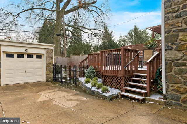 a picture of a room with a white wall and a picture