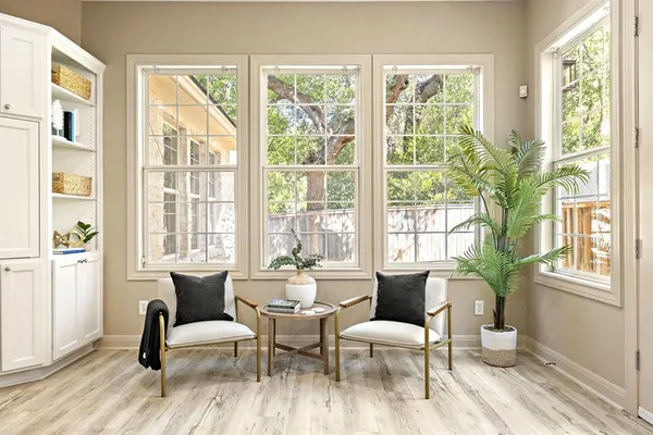 a living room with furniture and a window