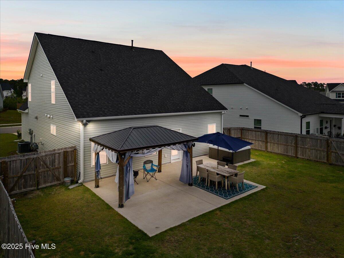 5735 Orchardgrass Road Leland, NC 28451 - Photo 35 of 54 TV and Pergola Stay