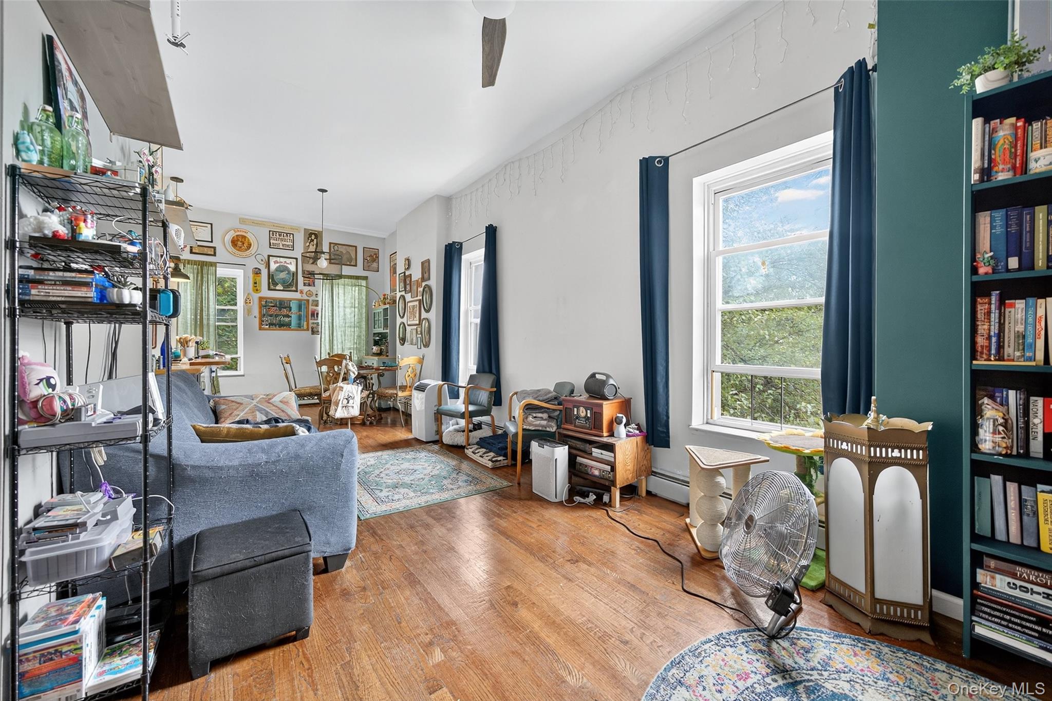 153 Lander Street Newburgh, NY 12550 - Photo 11 of 39 a living room with furniture and a large window