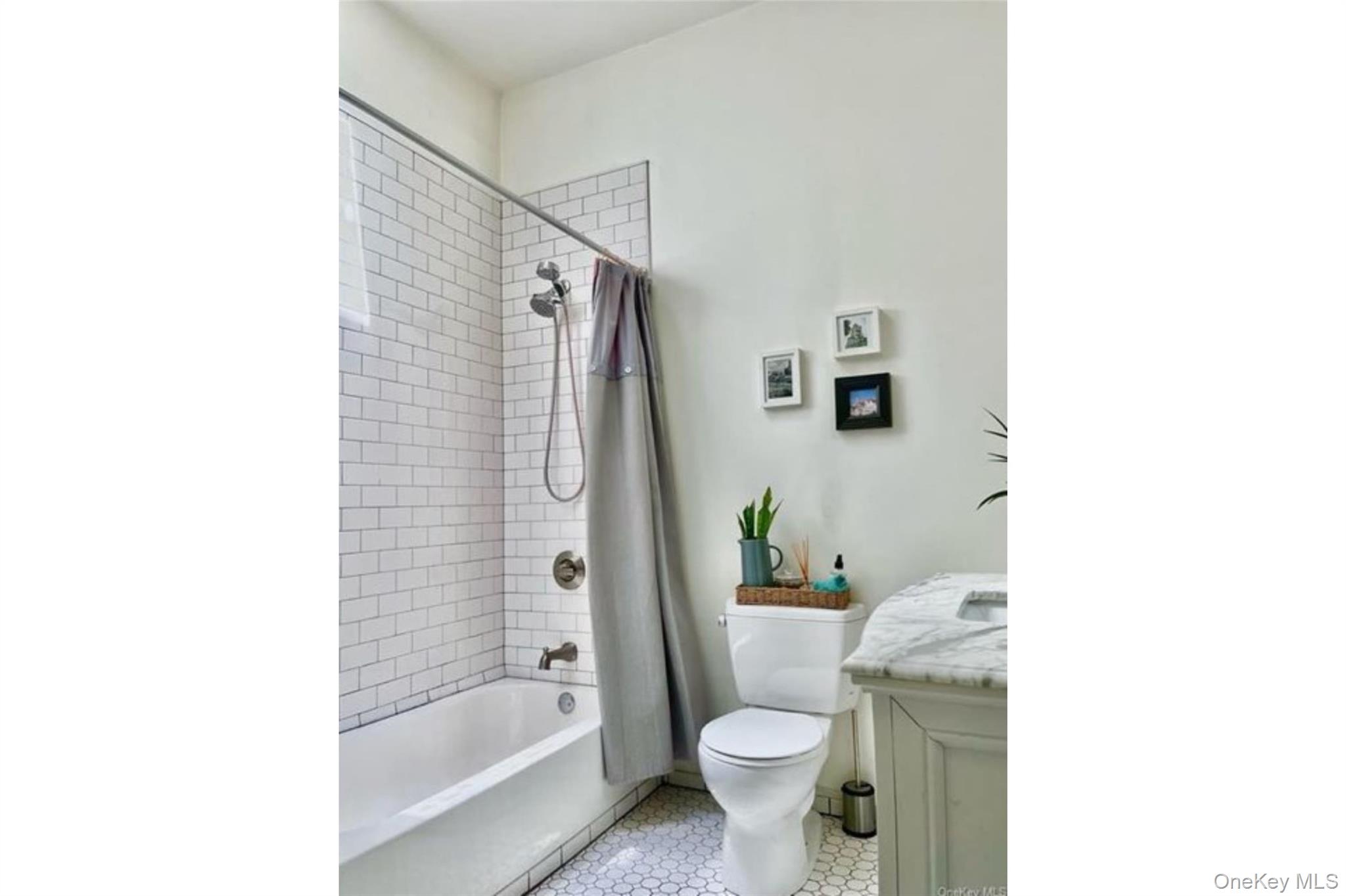 153 Lander Street Newburgh, NY 12550 - Photo 17 of 39 a bathroom with a bathtub toilet and sink