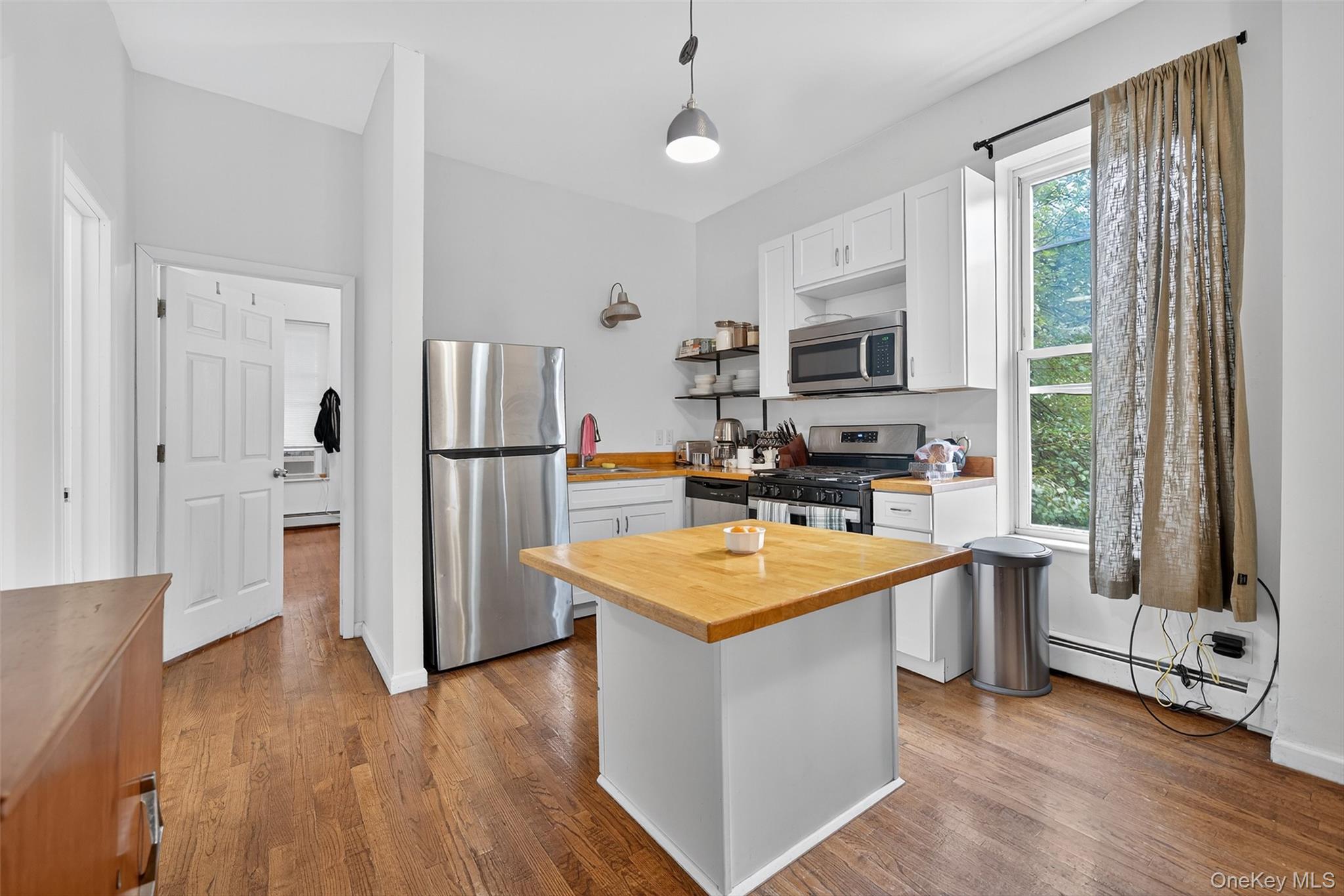 153 Lander Street Newburgh, NY 12550 - Photo 21 of 39 a kitchen with stainless steel appliances granite countertop a refrigerator a sink dishwasher a stove and a refrigerator