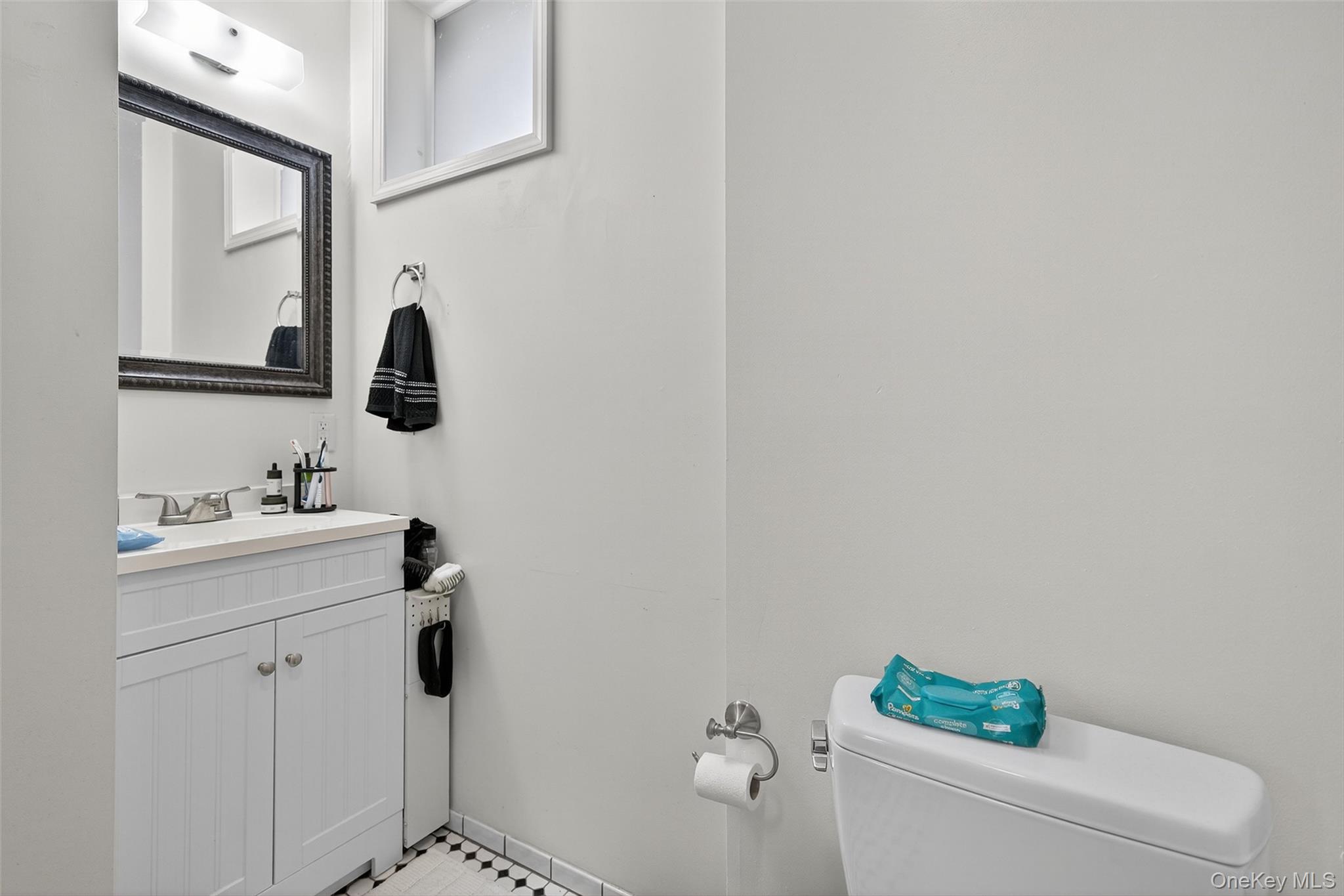 153 Lander Street Newburgh, NY 12550 - Photo 25 of 39 a bathroom with a sink and a mirror