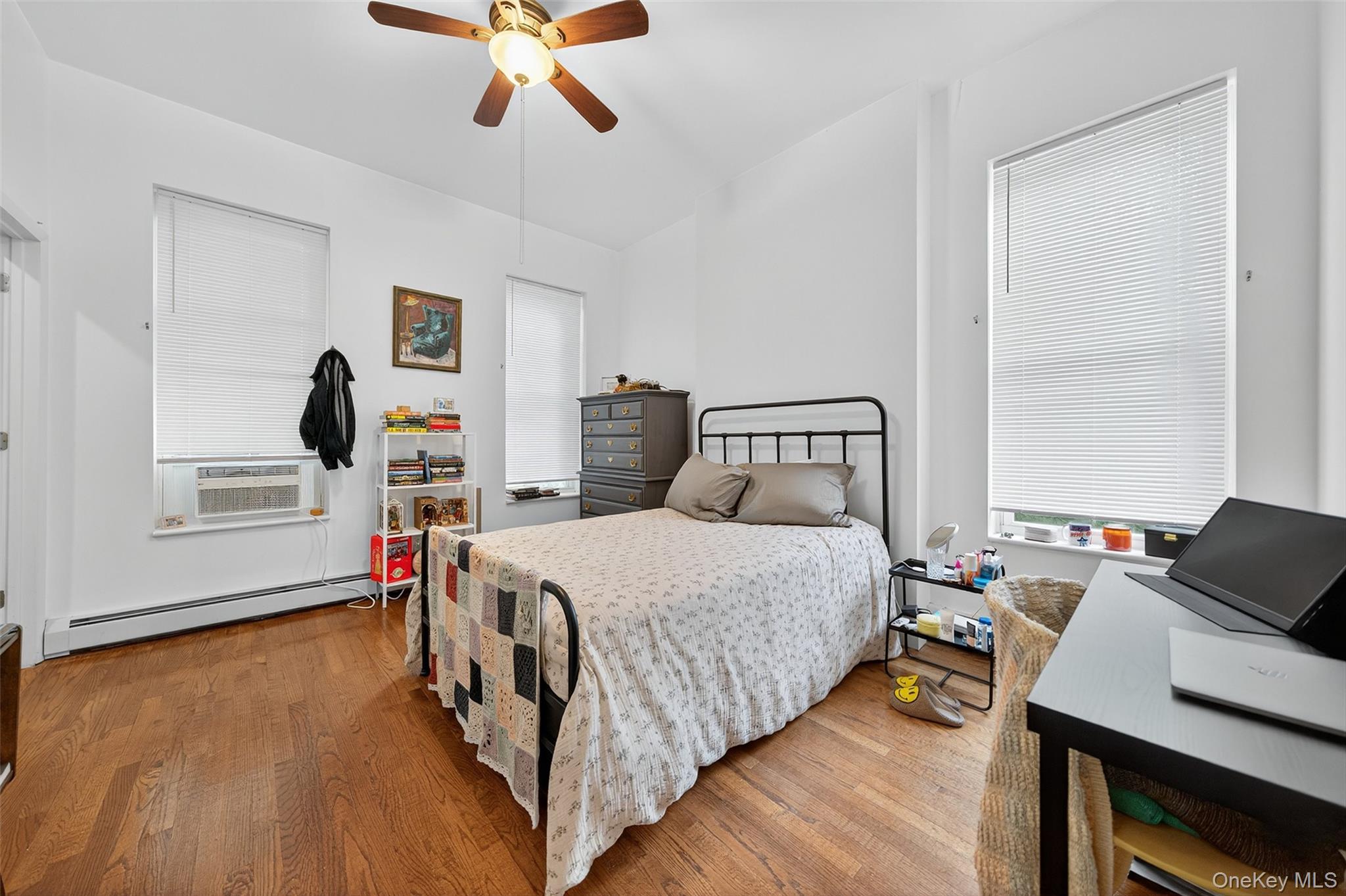 153 Lander Street Newburgh, NY 12550 - Photo 26 of 39 a bedroom with a bed and a window