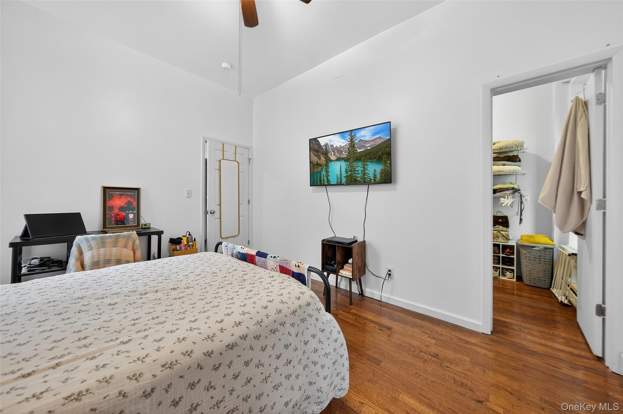 153 Lander Street Newburgh, NY 12550 - Photo 27 of 39 a bed room with a bed and a television