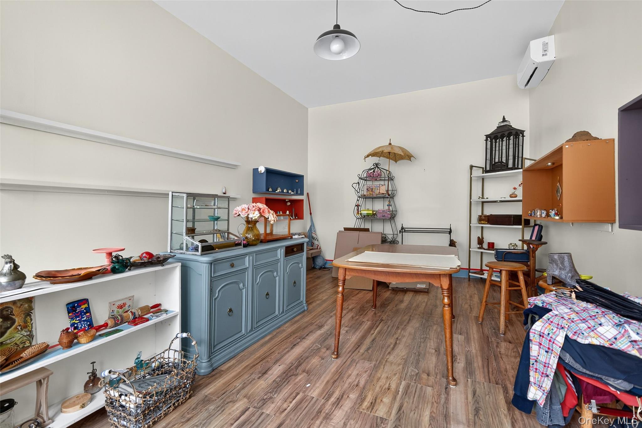 153 Lander Street Newburgh, NY 12550 - Photo 8 of 39 a very nice looking room with a wooden floor and a sink