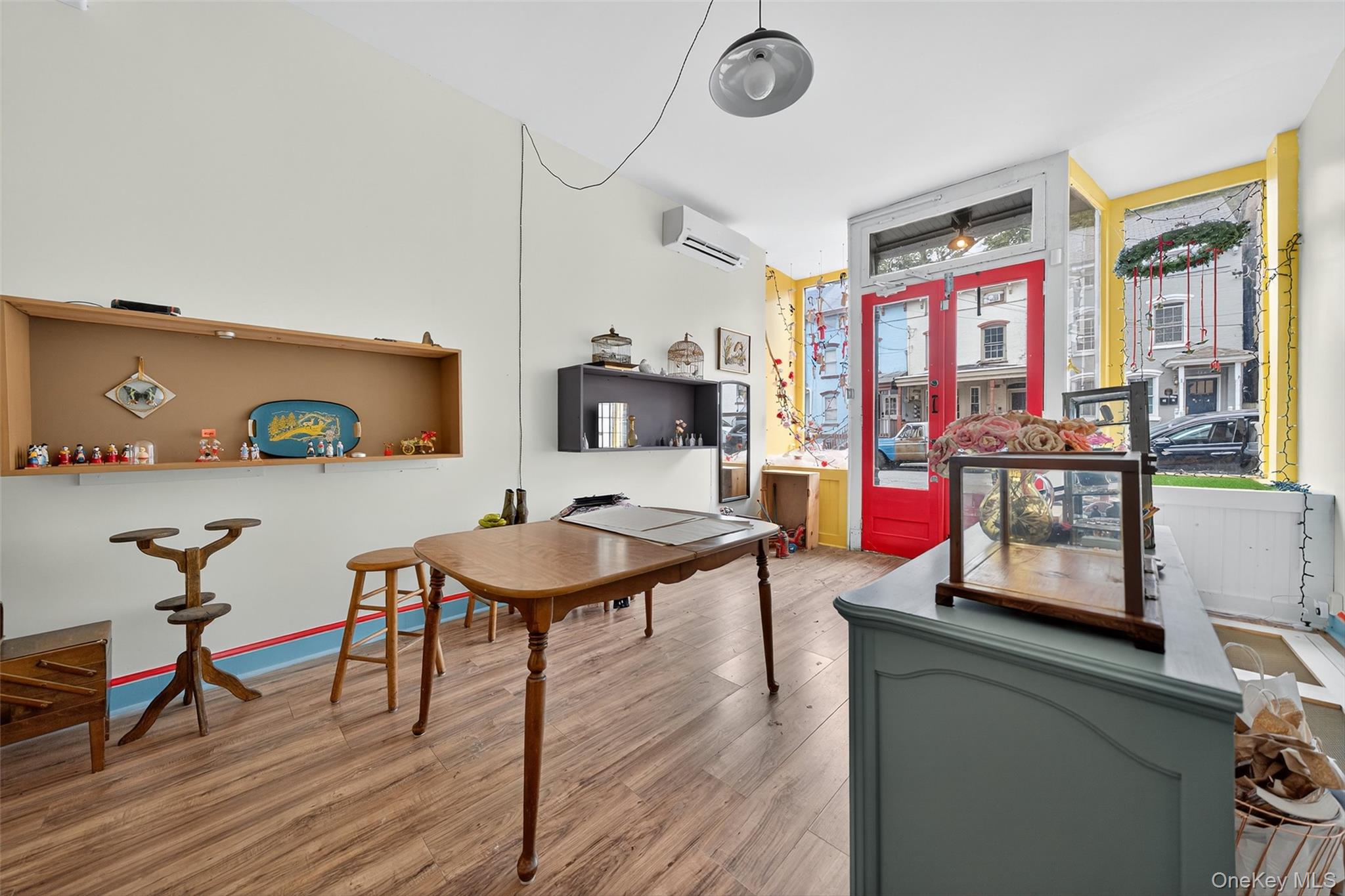 153 Lander Street Newburgh, NY 12550 - Photo 9 of 39 a living room with furniture a rug and a flat screen tv