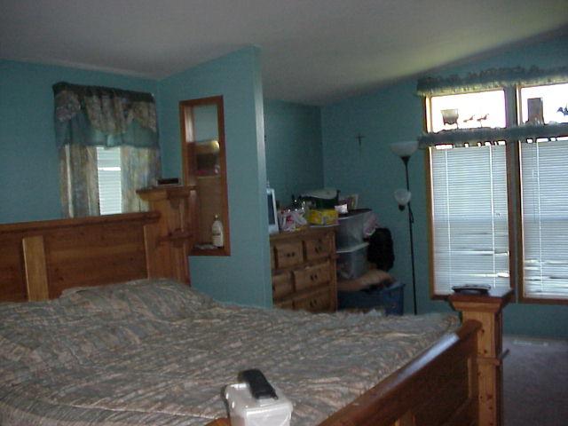 931 Lester Road South Outlook, WA 98938 - Photo 4 of 8 a room with a bed and furniture