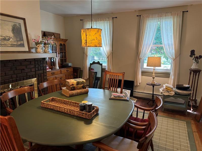 149 South Franklin Street Prospect, PA 16052 - Photo 9 of 25 a living room with furniture and a fireplace
