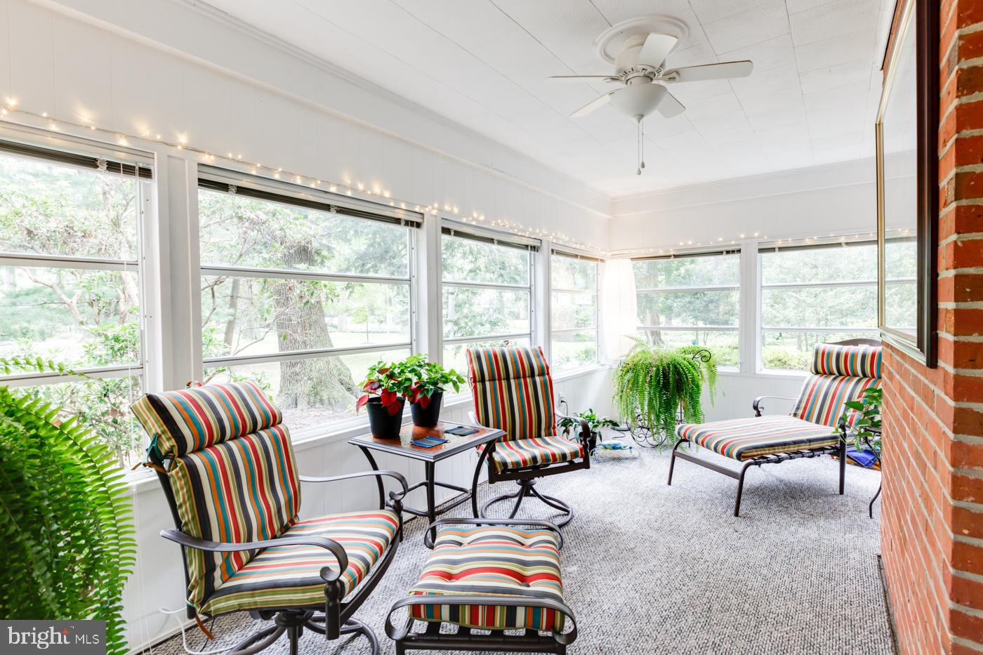 Living Room Leads to Sun Room