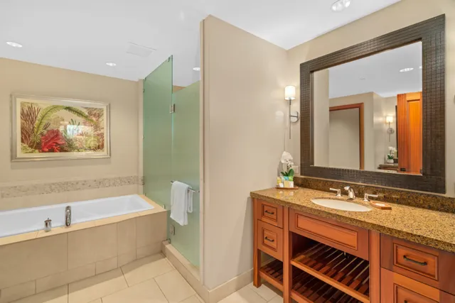 a bathroom with a bathtub and a sink