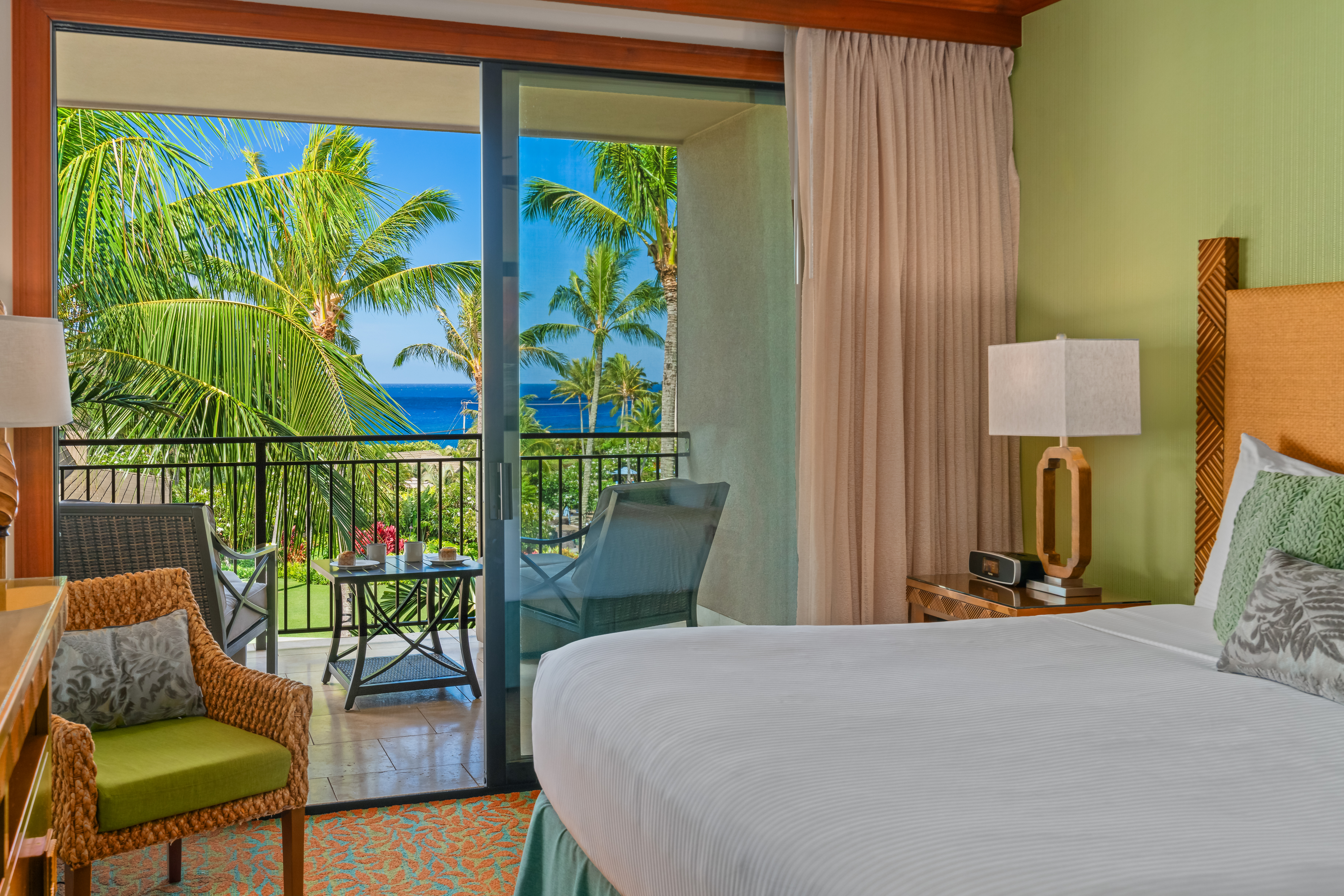 2641 Poipu Road, Unit 1202 Koloa, HI 96756 - Photo 15 of 30 a bedroom with a bed a painting on the wall and a window