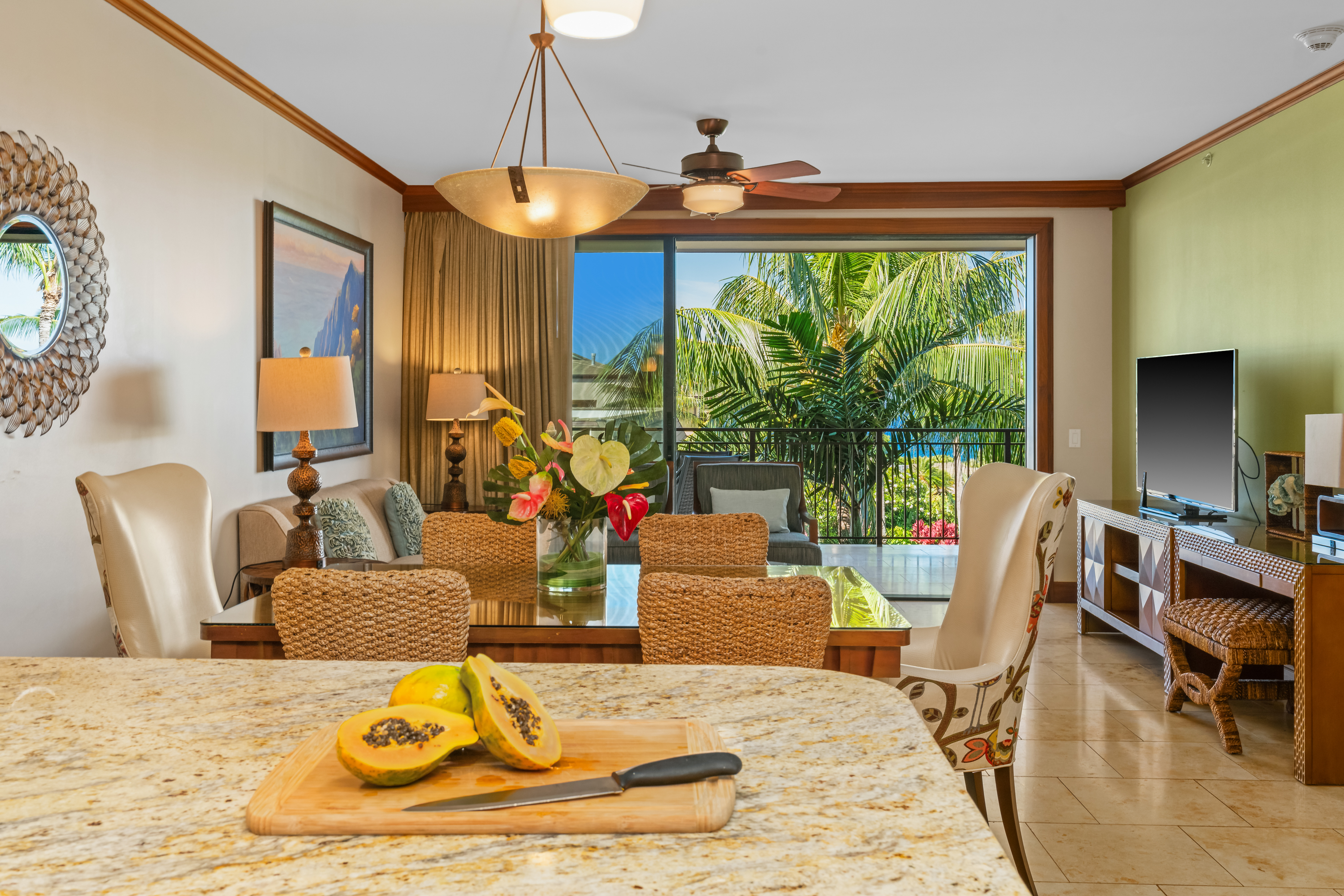 2641 Poipu Road, Unit 1202 Koloa, HI 96756 - Photo 2 of 30 a living room with patio furniture and a large window