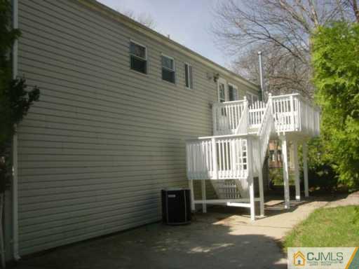 2 Highpoint Drive Edison, NJ 08820 - Photo 7 of 7 a view of a house with a yard