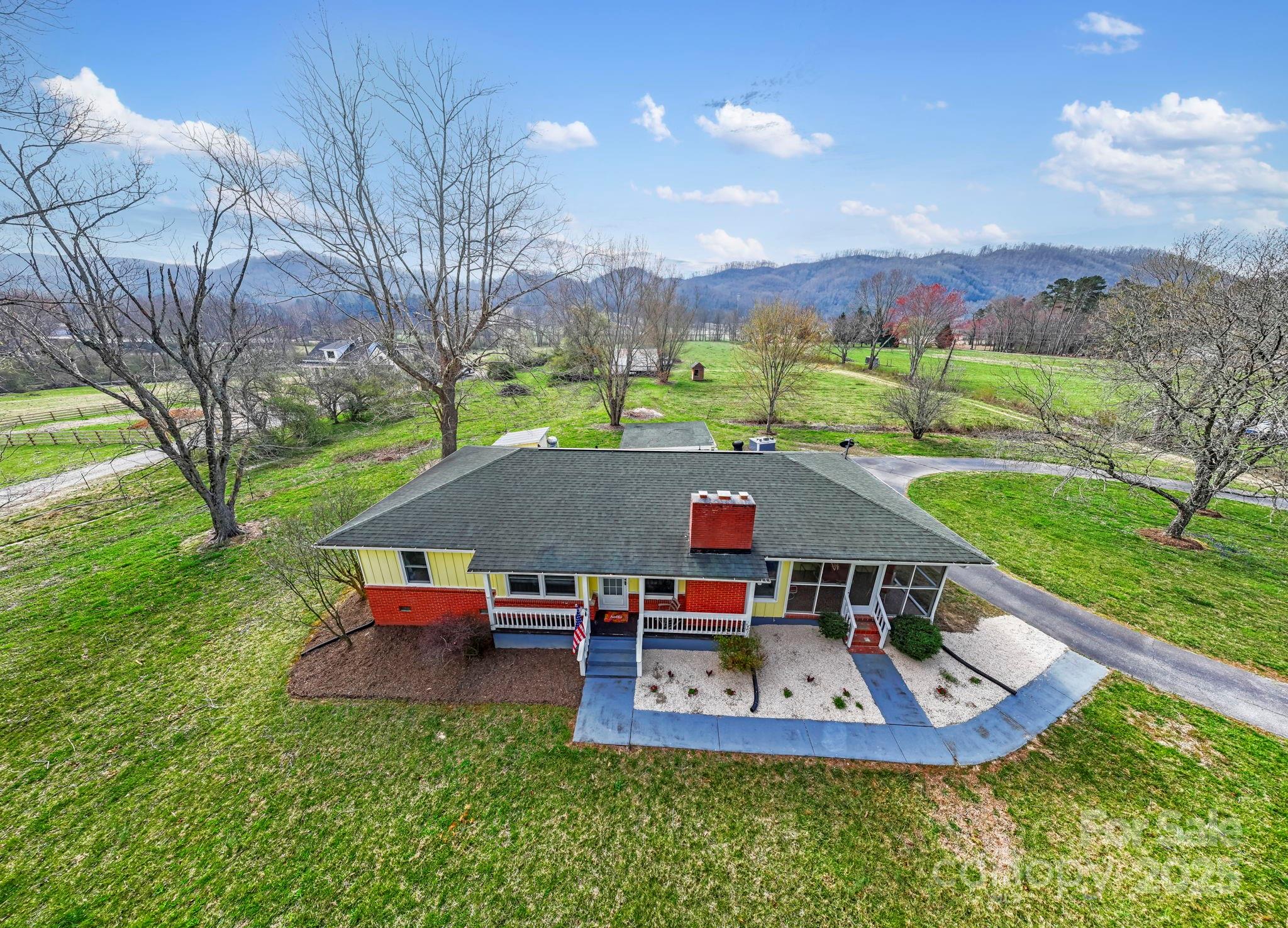 1450 Cane Creek Road Fletcher, NC 28732 - Photo 27 of 36 an aerial view of a house with swimming pool garden and patio