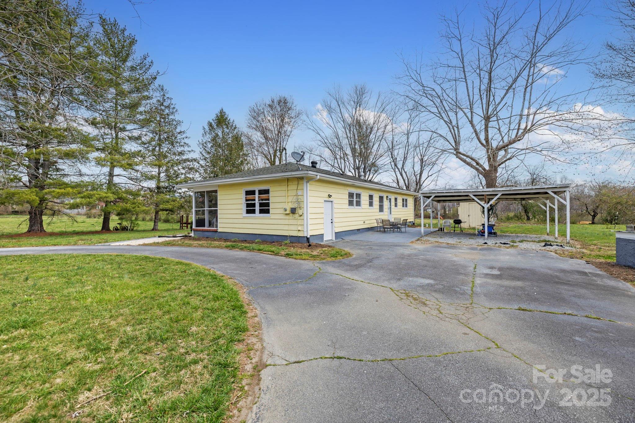 1450 Cane Creek Road Fletcher, NC 28732 - Photo 31 of 36 a view of house with outdoor space and parking