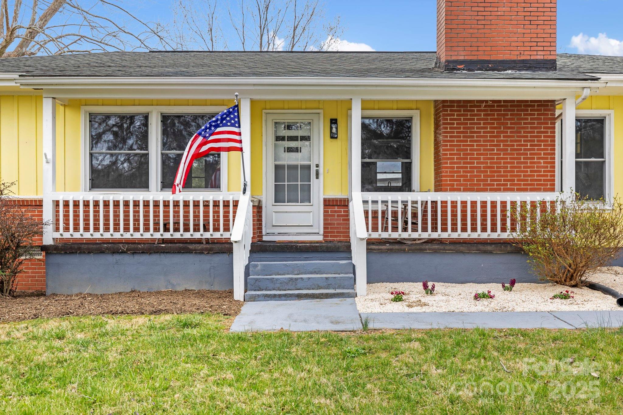 1450 Cane Creek Road Fletcher, NC 28732 - Photo 5 of 36 a view of front door with a chair