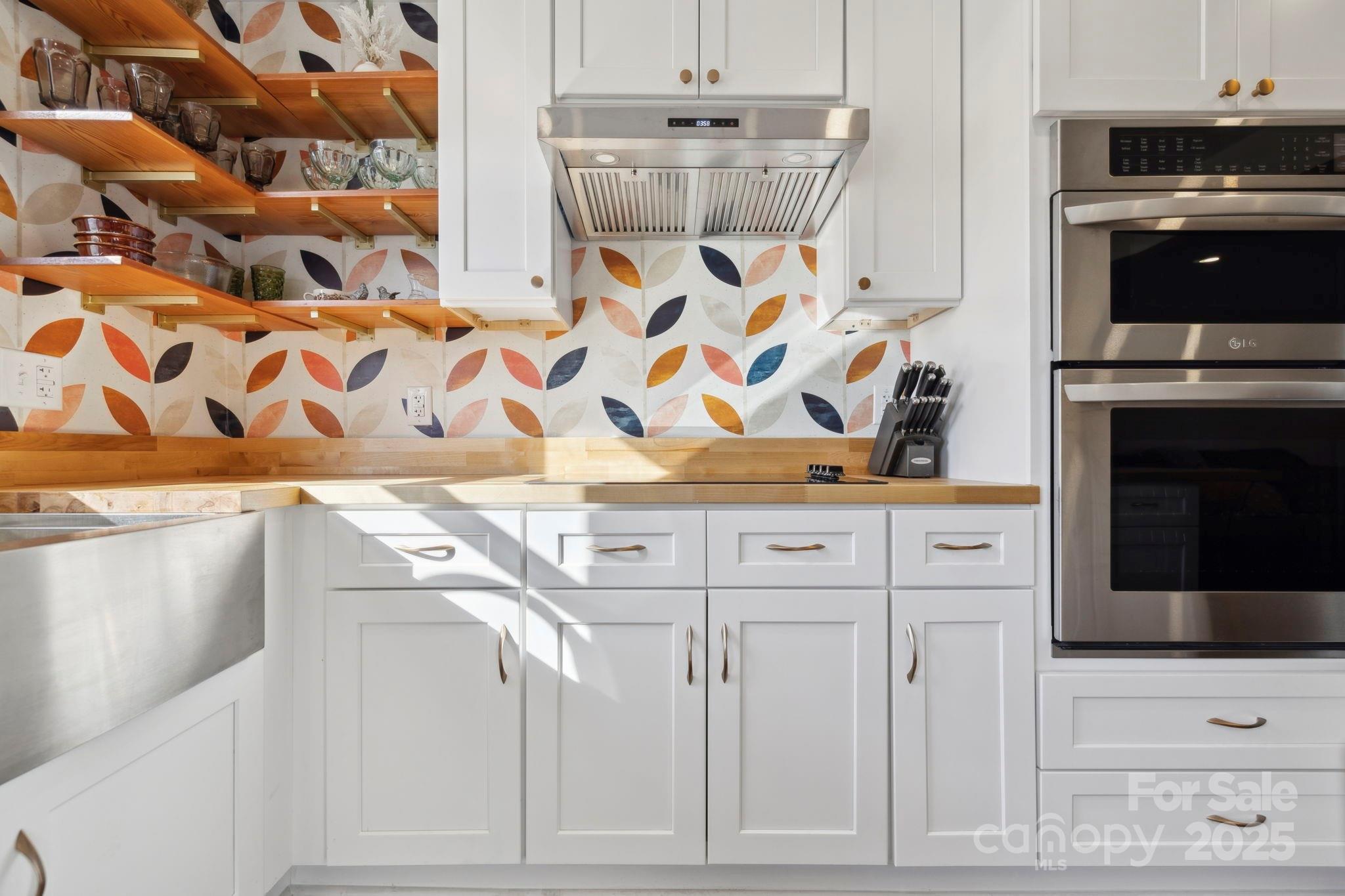 1450 Cane Creek Road Fletcher, NC 28732 - Photo 9 of 36 a bathroom with a sink and a mirror