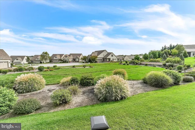 a view of a golf course with a park