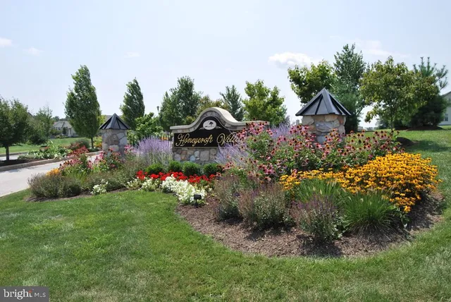 a building outdoor space with patio couches and glass door