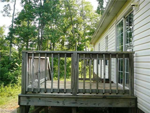 6792 Wright Road Thomasville, NC 27360 - Photo 14 of 16 Other. Deck overlooks the woods.