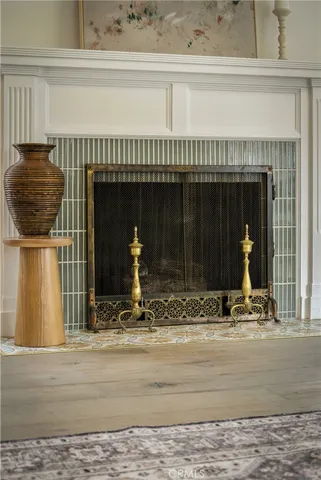 a bedroom with a bed lamp and window