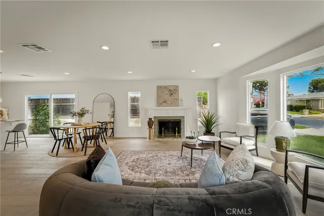 a kitchen with a sink and potted plant